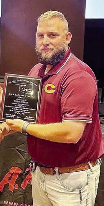 Clinton Police Department School Resource Officer Dillon Whitten accepts the D.A.R.E. Officer of the Year Award. CDN | Courtesy photo
