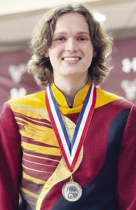 Clinton High School senior Jackson McCullough stands during High School Shortgrass Honor Band, where he was recognized as a 3-year high school medalist, held at the Pioneer Performing Arts Center in Elk City. CDN | Courtesy photo