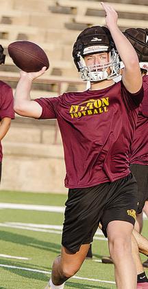 Freshman Liam Lofland pulls his arm back as he prepares to throw the ball during practice at the Tornado Bowl. CDN | Sam Goodwyn