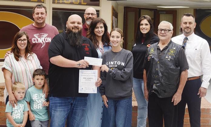 Clinton High School senior Zoe Howell placed second in her artwork in the state in a competition put on by the Oklahoma Masonic Chair Foundation. She received $1,500 and a certificate. Pictured in the front row from left are Jentry Howell Spitz holding he