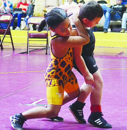 Clinton’s Otha Douglas tries to take fellow Clintonite Hudson Allen to the ground during the Elementary Wrestling Tournament last weekend at the Tornado Dome. CDN | Sam Goodwyn