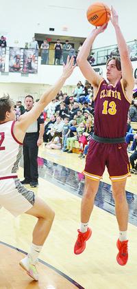 No. 13 Ethan Lofland shoots over an Eagles defender during Clinton’s road game in Weatherford. CDN | Sam Goodwyn