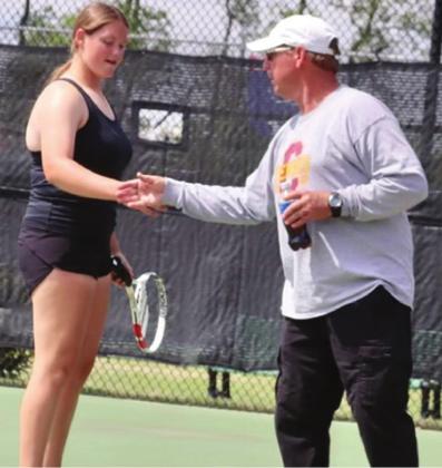 CHS tennis coach living his dream