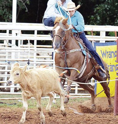 Shyla Navarre chases after a calf during last year’s Clinton Rodeo at the Clinton Round-Up Club Arena. CDN | Sam Goodwyn