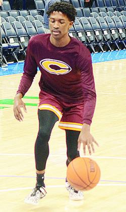 Atticus Thompson drives to the basket during warm-ups prior to the “Court of Dreams” game at the Paycom Center. CDN | Sam Goodwyn