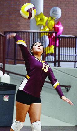 Clinton’s Danna Mendieta serves the ball during the Lady Reds’ home match against Blair Tuesday in the Tornado Dome. CDN | Sam Goodwyn