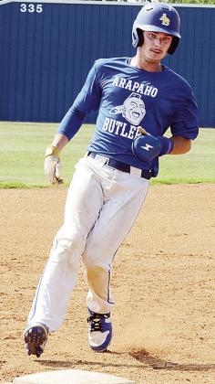 Arapaho-Butler’s Cutter King hustles into third base during the Indians’ home game against Elk City. CDN | Sam Goodwyn