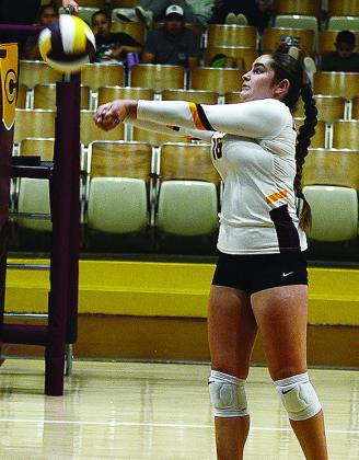 Clinton’s No. 16 Vanessa Schmitz return serves the ball back over the net during the Lady Reds’ match against Weatherford. CDN |Sam Goodwyn