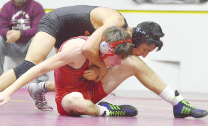 Clinton wrestling boasts four grads at next level