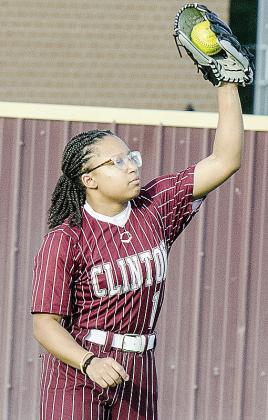 Clinton’s Ale-Jia Lacy catches the ball during warm-ups prior to the Lady Reds’ JV game against Bishop McGuinness. CDN |Sam Goodwyn
