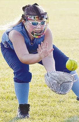 Arapaho-Butler’s Kynlee Brinkley focuses on the ball as she collects the ground ball during the Lady Indians’ first game of the OK Kids 8U State Softball Tournament Wednesday at Schumacher Fields at Acme Brick Park. CDN | Sam Goodwyn