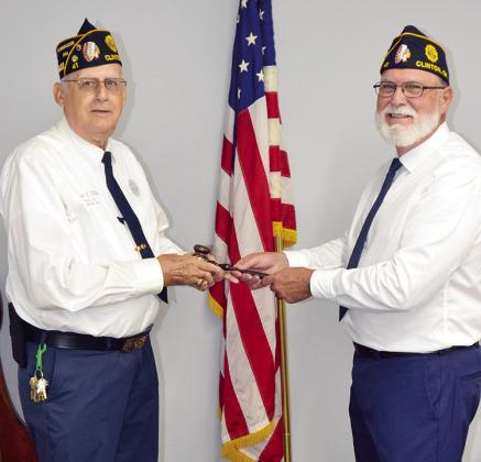 Former American Legion Post 41 Commander Donald Miller, left, presents the gavel to Keith Brisco to serve as commander for the chapter. CDN | Courtesy photo