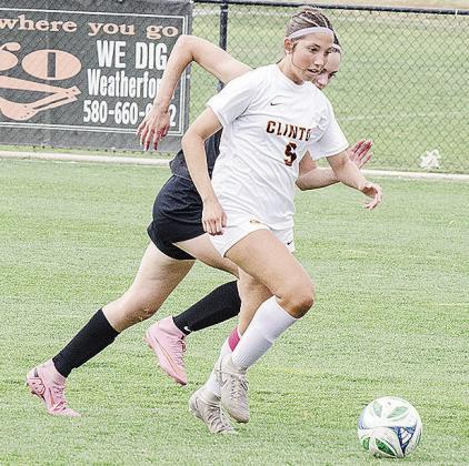 No. 9 Maddi McAtee beats the Weatherford player to the ball Tuesday in Clinton’s game against the Lady Eagles. CDN | Sam Goodwyn