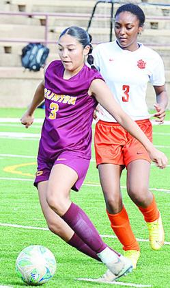 No. 3 Alyson Lopez beats a Douglass player to the ball during Clinton’s home game Tuesday against the Lady Trojans. CDN | Sam Goodwyn