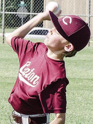 Mark Misak throws the ball during Clinton’s first-round game in the OK Kids 8U Baseball State Tournament at Acme Brick Park. CDN |Sam Goodwyn