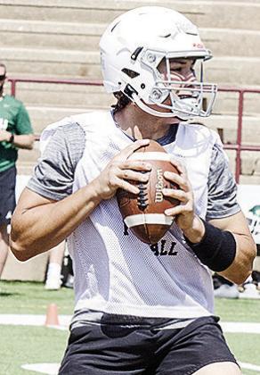 Clinton’s Easten Powell scans the field during a 7-on-7 game in the Tornado Bowl. CDN | Sam Goodwyn