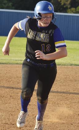 No. 13 Lauryn McHenry hustles to third base during A-B’s season-opening win Monday against Merritt. CDN | Sam Goodwyn