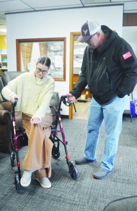 Camryn Wann, left, and Billy Goodwin tests out the comfortability of the equipment for sale at Western Medical Equipment. CDN | Micah Ashcraft