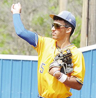 A-B’s Orsan Jubara gets the ball back to the pitcher during the Indians’ home game against Clinton. CDN | Sam Goodwyn