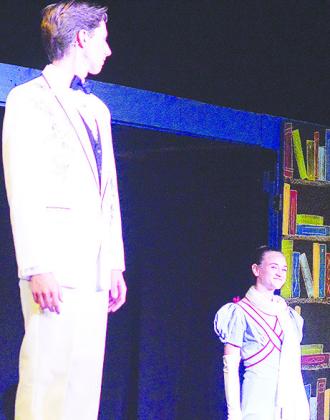 Braxton Driskill, left, and Jovi Petzold play the respective roles of The Escapologist and The Acrobat during the production of “Matilda,” hosted at Southwest Playhouse. CDN | Micah Ashcraft