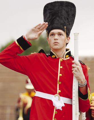 Clinton High School Drum Major Jackson McCullough salutes the judges ahead of the band’s “British Invasion” show at the Hub City Invitational Marching Contest at CHS. CDN | Courtesy photo