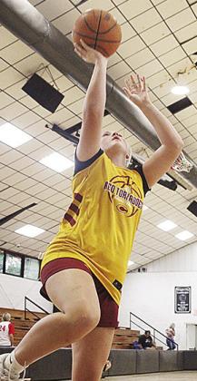 Clinton’s Rhylee Rodebush goes up for the layup during a basketball camp in Broken Bow. CDN | Courtesy photo