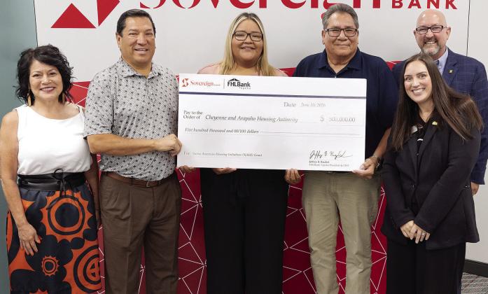Commemorating a $500,000 housing grant are, from left, Sovereign Bank VP Tribal Relations Manager Debbie Lindsey; Cheyenne and Arapaho Housing Authority Gov. Reggie Wassana; Cheyenne and Arapaho Housing Authority Housing Specialist Joscelyn Tapaha; Cheyenne and Arapaho Housing Authority Executive Director Damon Dunbar; Federal Home Loan Bank Topeka FVP, Community Investment Officer and Director of Housing and Community Development Kylie Mergen; and Sovereign Bank CEO Bryan Cain. CDN | Courtesy photo