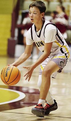 Kevin Rutz dribbles the ball up the court during Clinton Middle School’s eighth-grade basketball game against Weatherford. CDN |Steve Wheeler