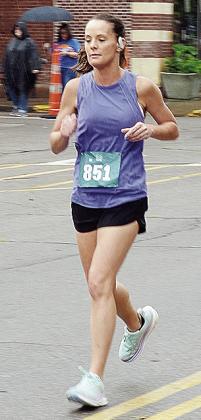 Clinton’s own Stephanie Bridgeman heads toward the finish line during the Clinton Classic Run Saturday on Frisco Avenue. CDN | Sam Goodwyn