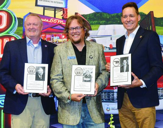 Saturday at the Frisco Center the Oklahoma Route 66 Association added to its Hall of Fame, from left, Charles Harland Tompkins as accepted by David Black, vice mayor for El Reno; Rhys Martin, president of the Oklahoma Route 66 Association; and Lt. Gov. Matt Pinnell. CDN | Christian Jacobsen