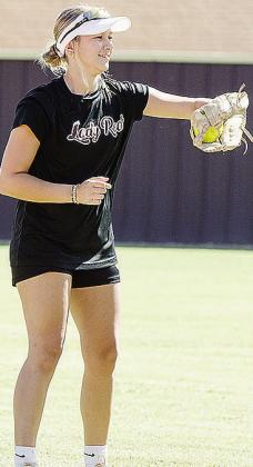 Clinton’s Hadley Meget catches the ball during warm-ups prior to a preseason practice at the high school softball field. CDN | Sam Goodwyn