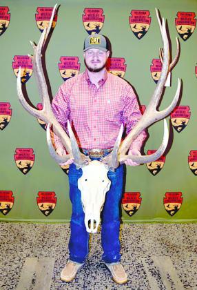 Zane Scrivner holds the antlers of the elk he took in September at Fort Sill. It is Oklahoma’s new record nontypical elk with a score of 411 1/8. CDN | Courtesy photo