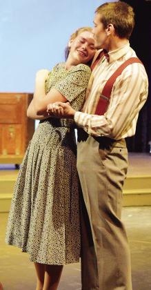 Lily Adkinson, left, and Landon Tisdale share a dance during the Southwest Playhouse’s production of “Bright Star.” CDN | Micah Ashcraft