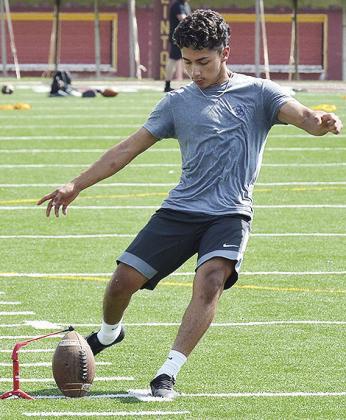 Clinton’s Luis Rodriguez works on his field goal kicks during practice in the Tornado Bowl. CDN | Sam Goodwyn