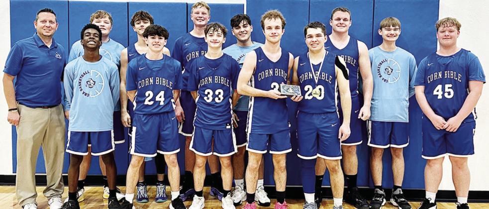 The Corn Bible Academy Crusaders finished third in the second annual Crusader Classic Tournament over the weekend at CBA. Pictured, from left, in front are Rolando Beadle, Alex King, Rylin Zeller, Jaden Zeller and Zack Zybach; back, Coach Zach House, Laws