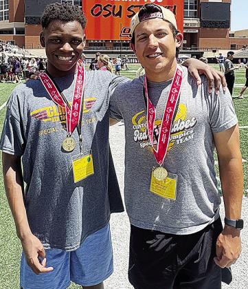 Bryson Miles, left, and Sutton Hernandez come together winning gold medals after competing in the Unified Bocce Ball competition at the Special Olympics Summer State Games at Oklahoma State University. CDN |Courtesy Photo