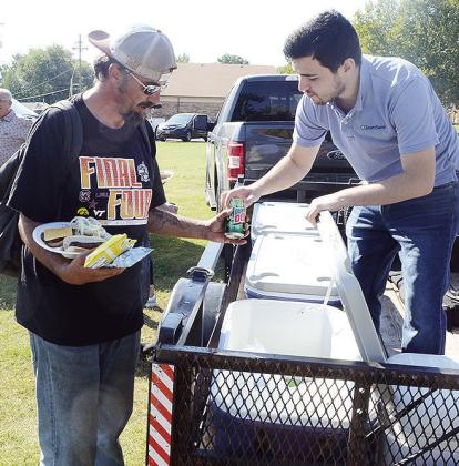 Bank showcases the spirit of Clinton with community cookout