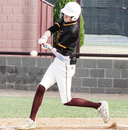 No. 1 Jeter King swings mightily at the ball during Clinton’s game Monday against Woodward at home. CDN | Sam Goodwyn
