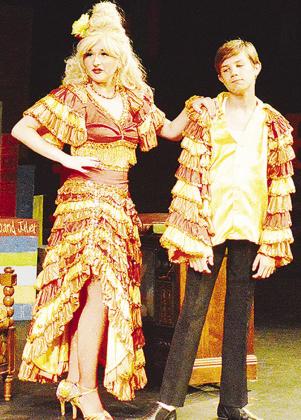 Hannah Gregory, left, as Mrs. Wormwood and Easton Byrd serves as her dance partner Rudolpho during a salsa dance sequence as part of Southwest Playhouses production of “Matilda.” CDN | Micah Ashcraft