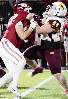 No. 54 Brayden Fuller blocks a defender during Clinton’s firstround loss to the Tigers in Tuttle. CDN | Micah Ashcraft