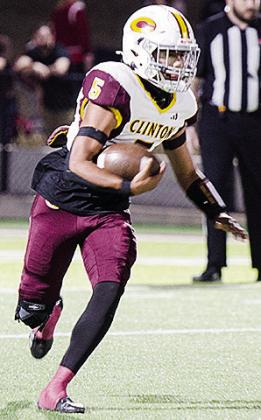 No. 5 Jesus Gutierrez carries the ball in Clinton’s Class 4A first-round game at Tuttle. CDN | Micah Ashcraft