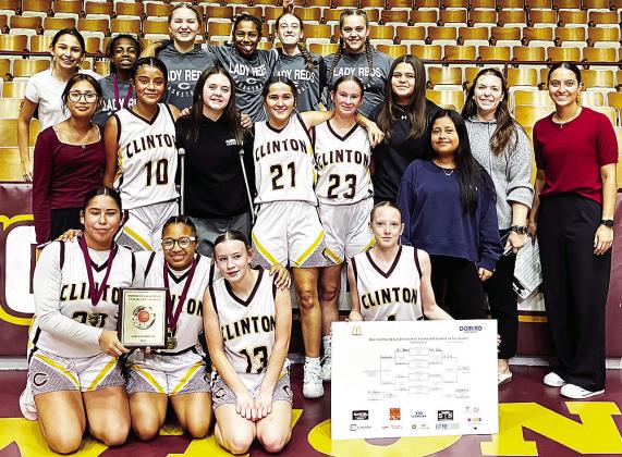 Clinton Middle School’s eighth-grade team celebrates winning the eighth-grade side of the CMS Basketball Tournament. Pictured, from left, kneeling are seventh-graders Jaeda Blackeagle, Ale-Jia Lacy, Hannah Miller and Destiny Krewall; middle row, Kira Rh
