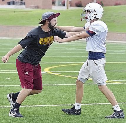 Gordon enjoying coaching at his alma mater