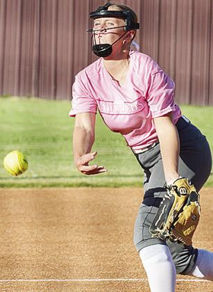 Emma Ray pitches from the circle during Clinton’s game Thursday against Bethany at home. CDN | Sam Goodwyn