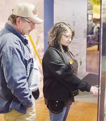 Jennifer Bartels of Colorado, right, directs her husband Clint’s attention to an item in the display case at the Oklahoma Route 66 Museum. CDN | Sam Goodwyn