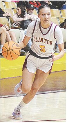 No. 5 Lillian Lime drives the ball to the hoop during Clinton’s game against Tuttle. CDN | Sam Goodwyn