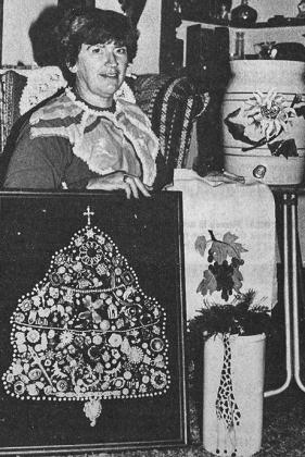 40 YEARS AGO “If it stands still, paint it,” was Marjean Moser’s motto. Here, she displayed a jewelry Christmas tree. Even a small jeweled letter opener found its way into the two-dimensional picture shown here. Tole painting decorated both crocks a