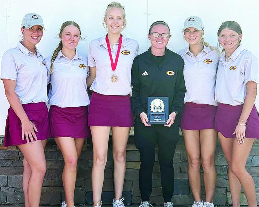 The Clinton Lady Reds are all smiles as they finish second at the Weatherford Golf Tournament Thursday at the Praire West Golf Course in Weatherford. Pictured, from left, are Grace Meacham, Jocelyn King, Addyson Littke, Coach Tasha Marshall, Addison Newco