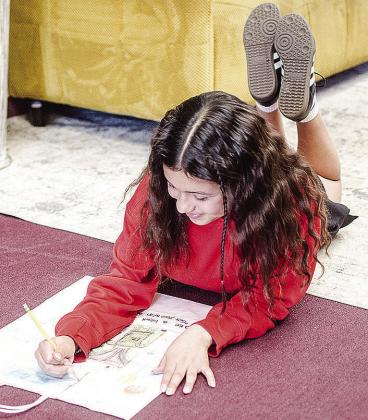 Students show Clinton spirit designing bags for Route 66 Museum