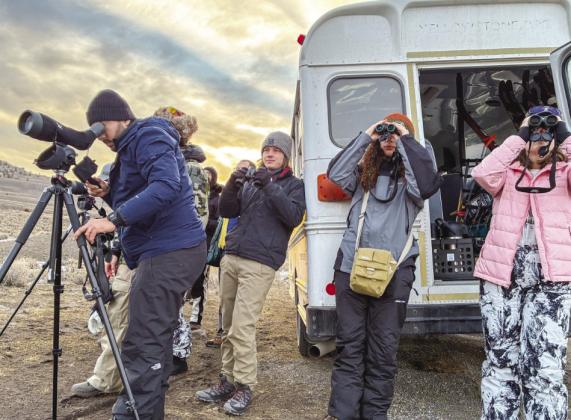 Dr. Daniel Rocha and SWOSU students Wake Frymire, Austin Buchanan, and Mary Kerr use field equipment to observe wildlife and scan the Yellowstone landscape during their study trip. CDN | Courtesy photo